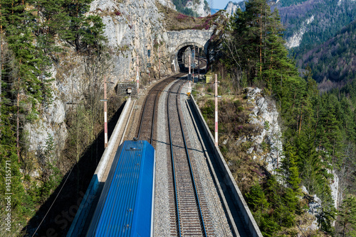 train passing a rail bridge, train viaduct, krausel klause, Semmering Bahn - unesco world heritage, Pollerus Wand