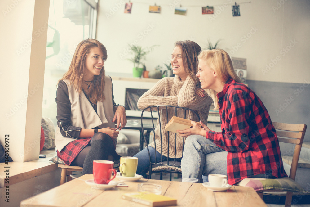 Students learning in a cafe. Students learning in a cafe.