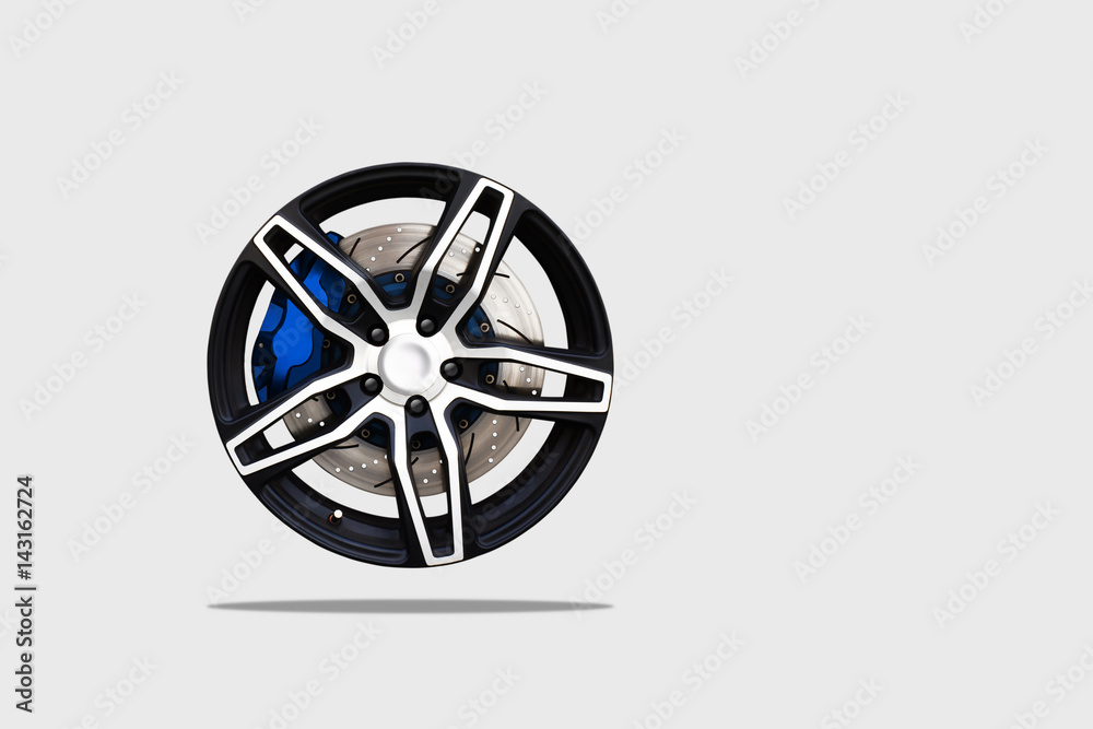 Close up of a modern sport wheel with brake disk and caliper pad. isolated background and clipping path. Close up of a modern sport wheel with brake disk and caliper pad. isolated background and clipping path.