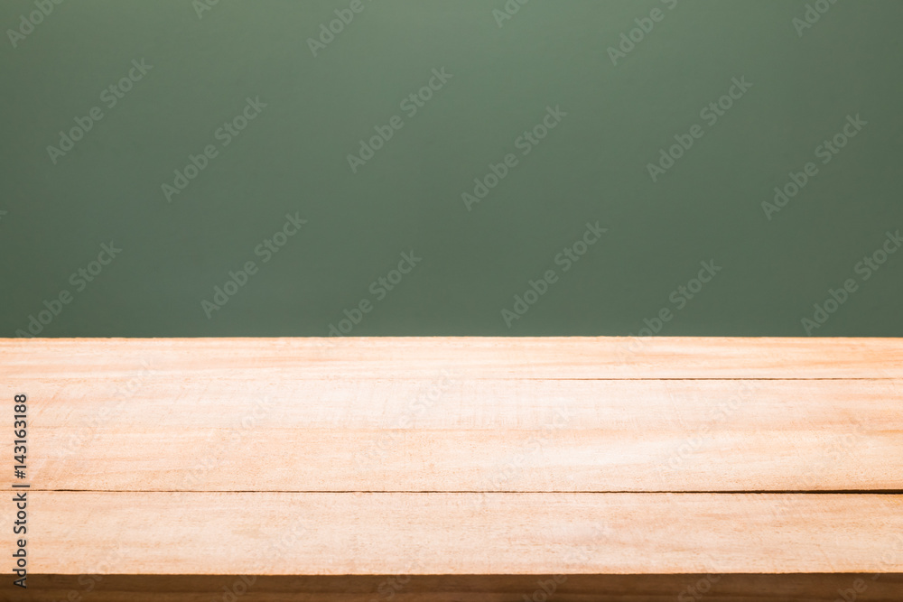 wood table with dark concrete wall background for product display. wood table with dark concrete wall background for product display.