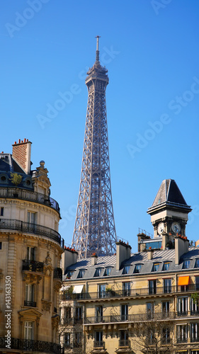 View on Eiffel Tower and urban street in Paris, France © denys_kuvaiev