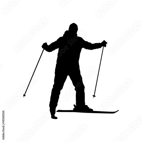 Silhouette of a skiing man