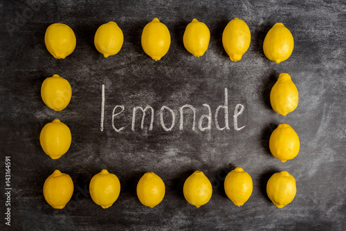 Fotografija Picture of lemons on grey background