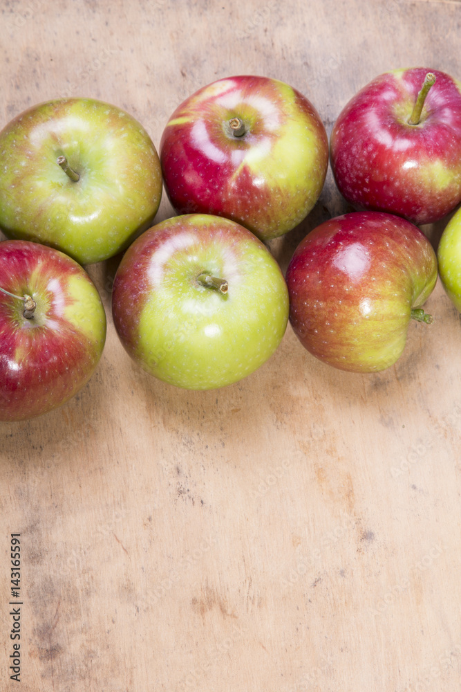 tasty apples on a wooden background
tasty apples on a wooden background
