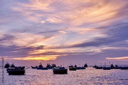 Vietnamese fishing village, Mui Ne, Vietnam, Southeast Asia. Landscape with sea and traditional colorful fishing boats © nevskyphoto