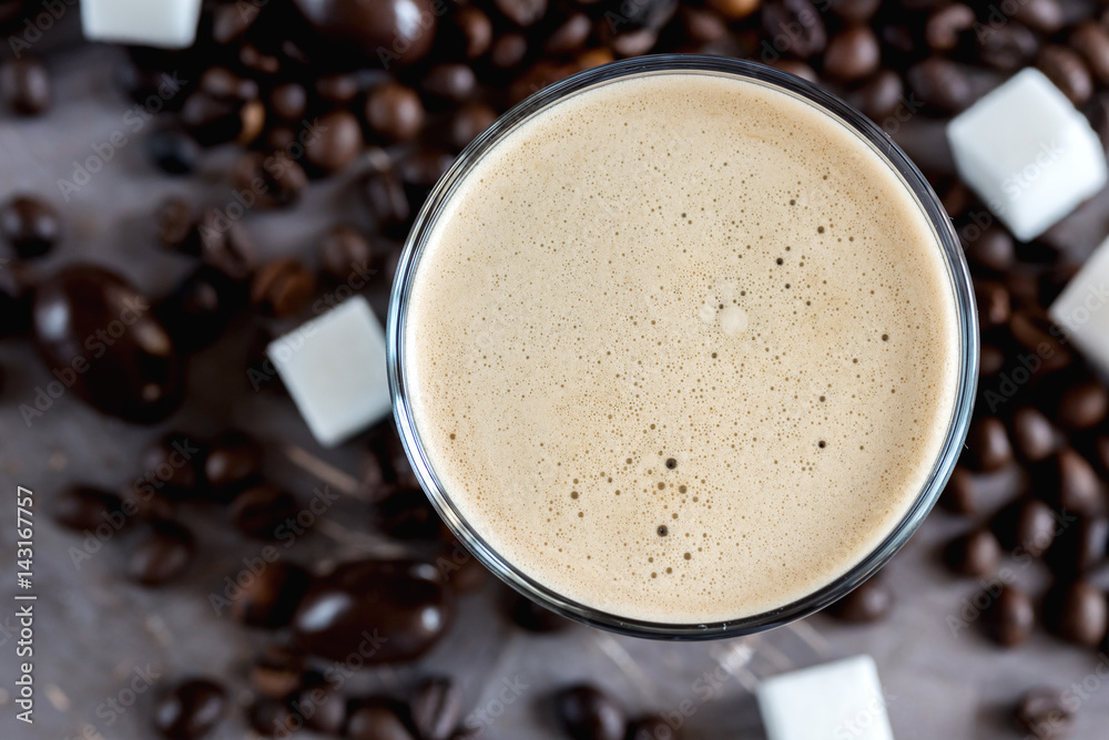 Bottle of black coffee and bottle of coffee with milk lying on background Horizontal photo Bottle of black coffee and bottle of coffee with milk lying on background Horizontal photo