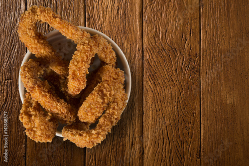 onion rings portion on the wood background