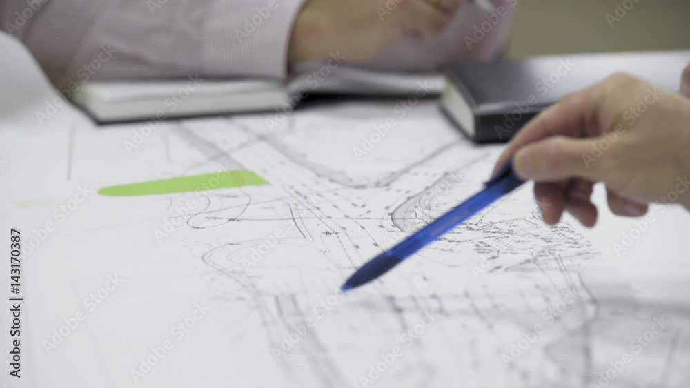 Team of architects people in group on construciton site check documents and business workflow Team of architects people in group on construciton site check documents and business workflow