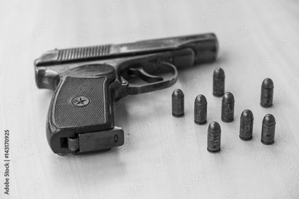 Military combat pistol in black and white Military combat pistol in black and white
