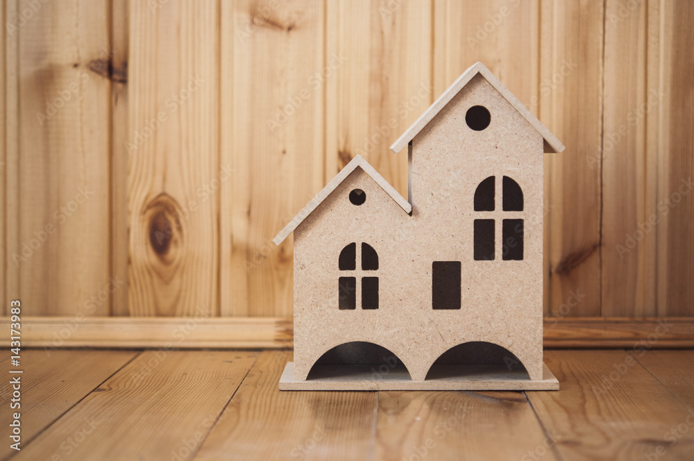 small house on wooden floor small house on wooden floor