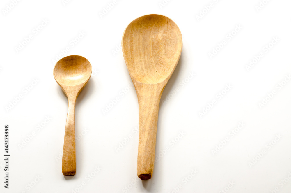 Wooden spoon and ladle on the white background Wooden spoon and ladle on the white background
