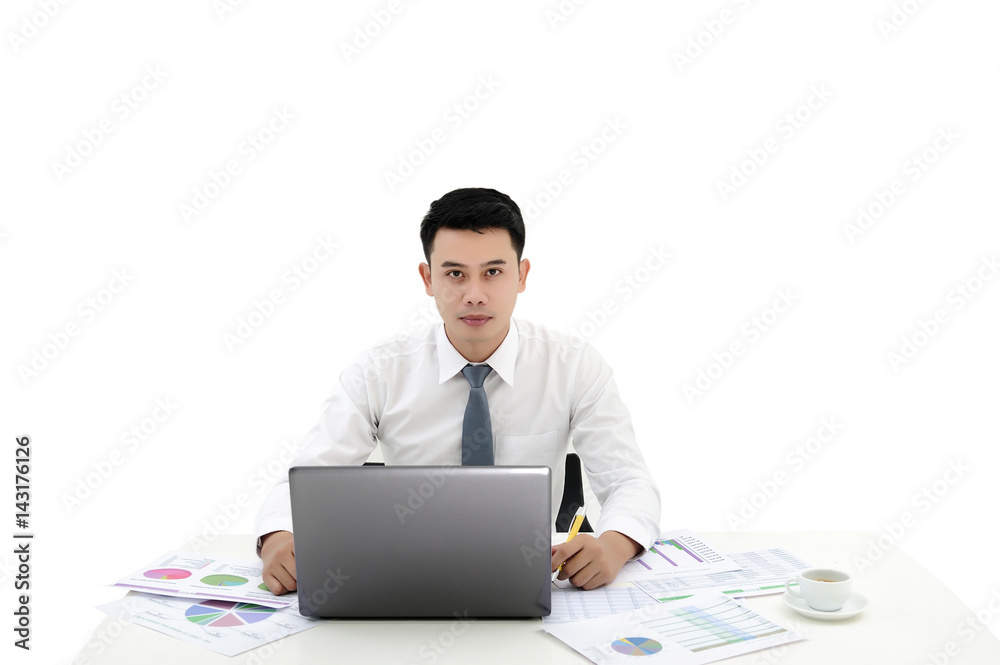 Portrait of young asian businessman working with laptop, documents on table Portrait of young asian businessman working with laptop, documents on table