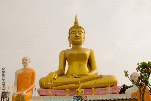 Big golden buddha Stucco at Wat Klong reua. Phitsanulok, Thailand. photo
