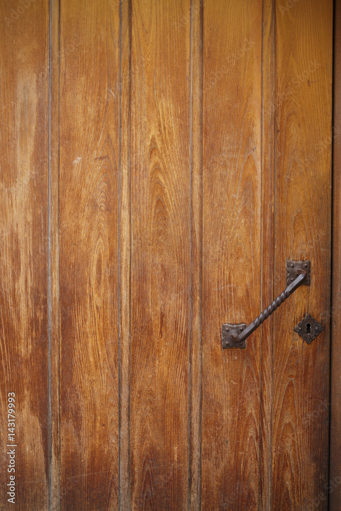 Old wooden door with rusty handle Architecture Old wooden door with rusty handle Architecture