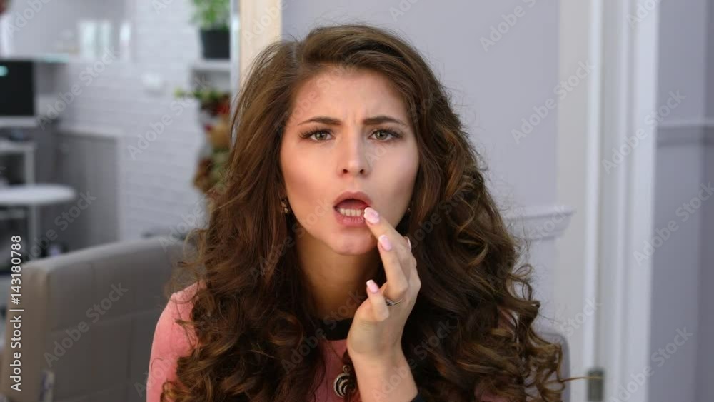 Face of beautiful brunette woman with make-up and hairstyle after stylists work Face of beautiful brunette woman with make-up and hairstyle after stylists work