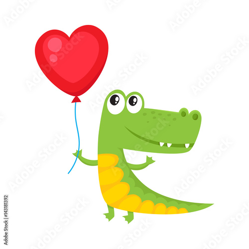 Cute and funny crocodile holding red heart shaped balloon, cartoon vector illustration isolated on white background. Crocodile holding heart balloon, birthday greeting decoration