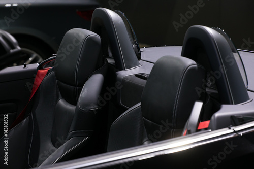 Black leather passenger seat in modern sport car, side  view © NVB Stocker