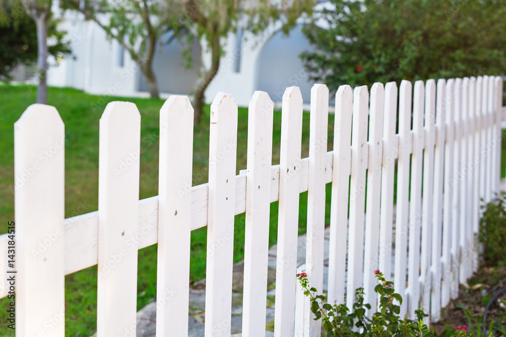 County style white wooden fence. County style white wooden fence.