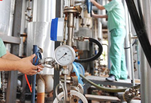 refinery engineers working in a large industry