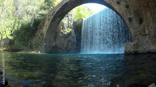 Waterfall - Arched bridge Palaiokarya, Trikala prefecture, Greece. photo