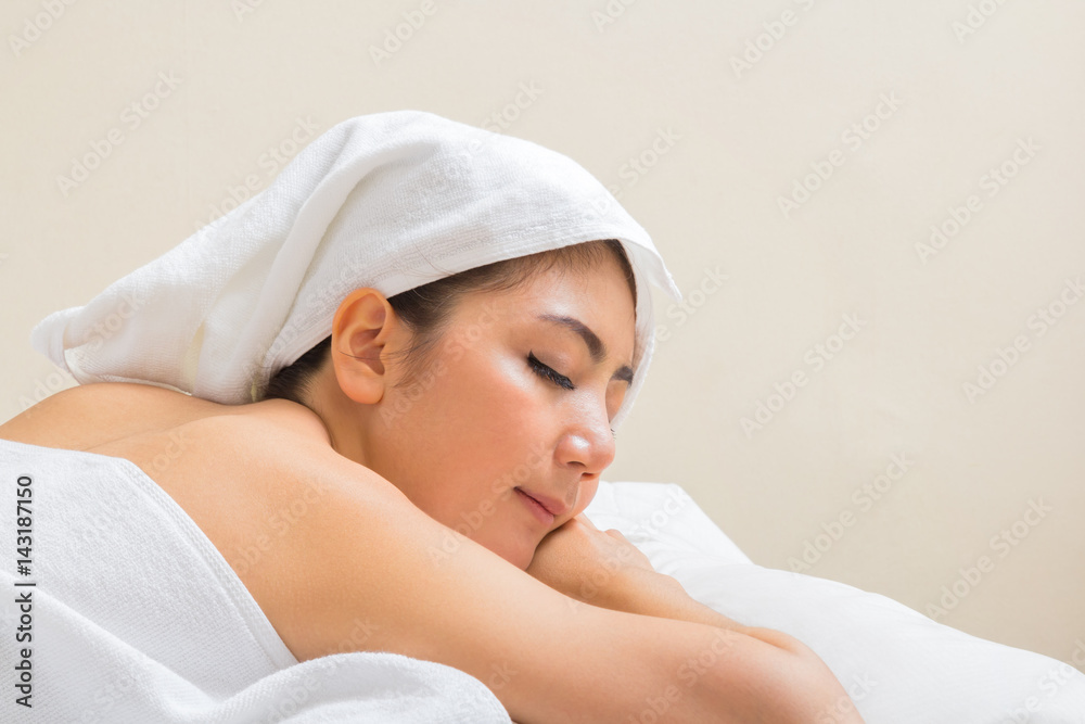 Portrait of young beatiful asian woman in spa massage, relaxing and beauty treatment in spa salon Portrait of young beatiful asian woman in spa massage, relaxing and beauty treatment in spa salon