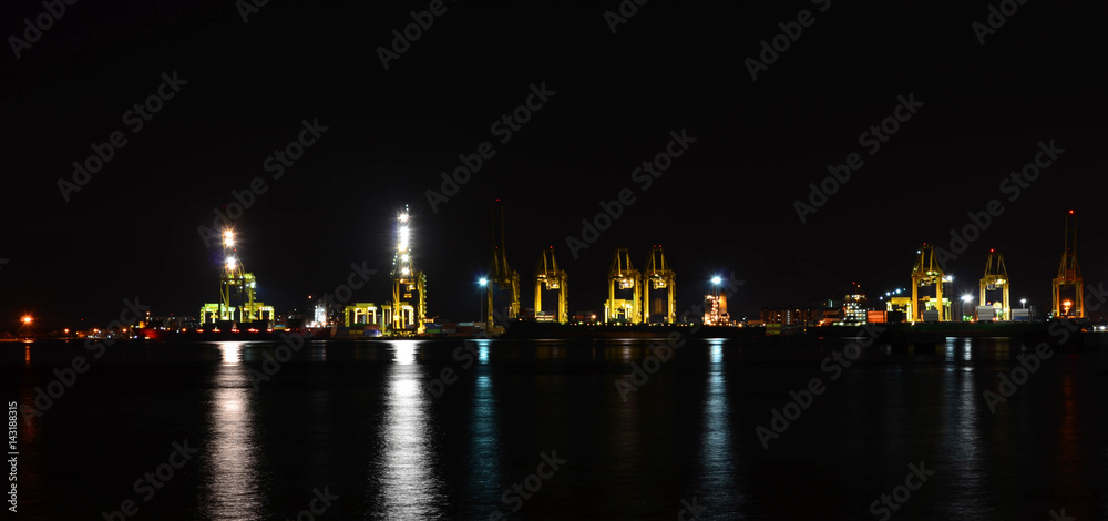 Night panorama scene of seaport container cargo freight
