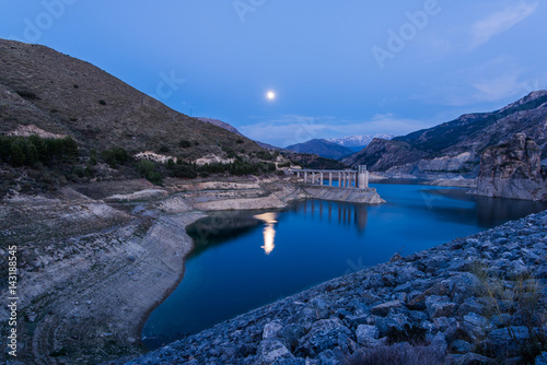 Reservoir Embalse de Canales in Granada, Spain at evening