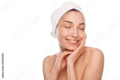 Happy woman enjoying her skin