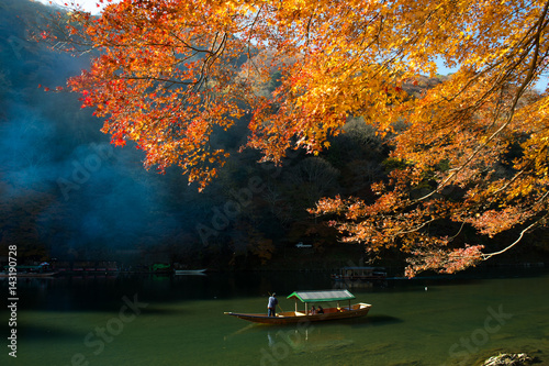 Hozugawa River boat ride, thrilling sightseeing experience scenic river cruise for nature enthusiasm. The great way to get a different perspective on country side floating down the river. photo