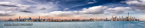 Panoramic view of New York City skyline at dusk