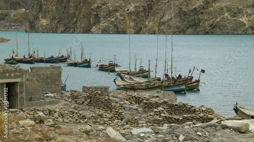 Moored boats on the river photo