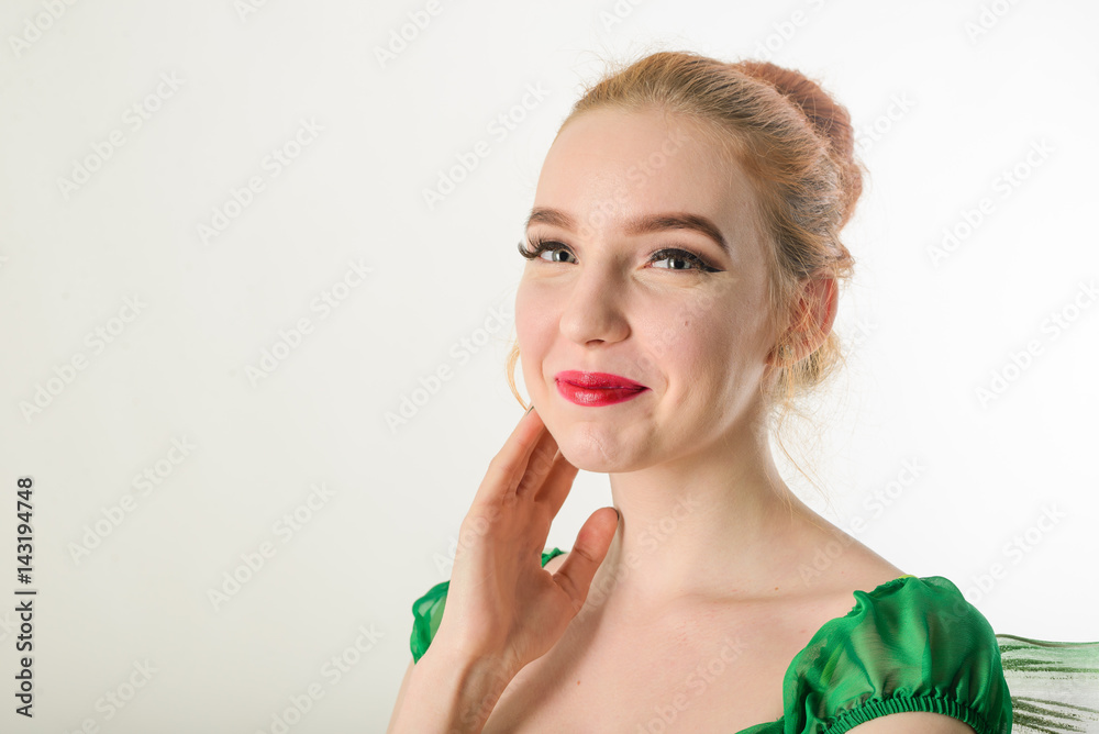 Beautiful girl smiling on a white background. Beautiful girl smiling on a white background.