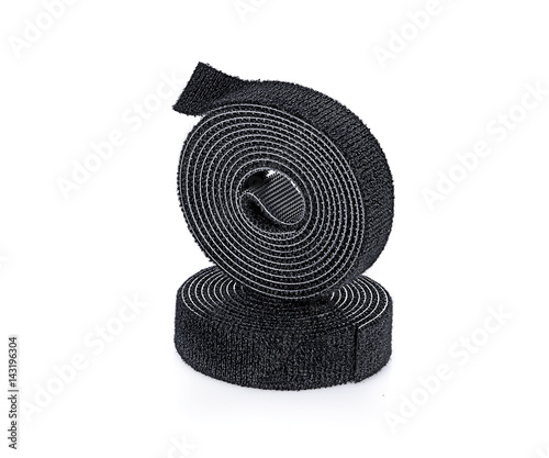 Foto Rolls of Velcro tape Strips isolated on white background