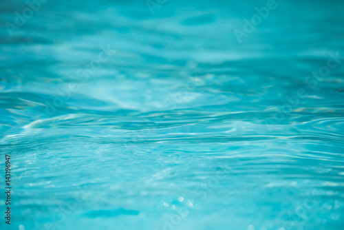 Close-up beautiful blue water surface and motion  Selective focus water surface in swimming pool