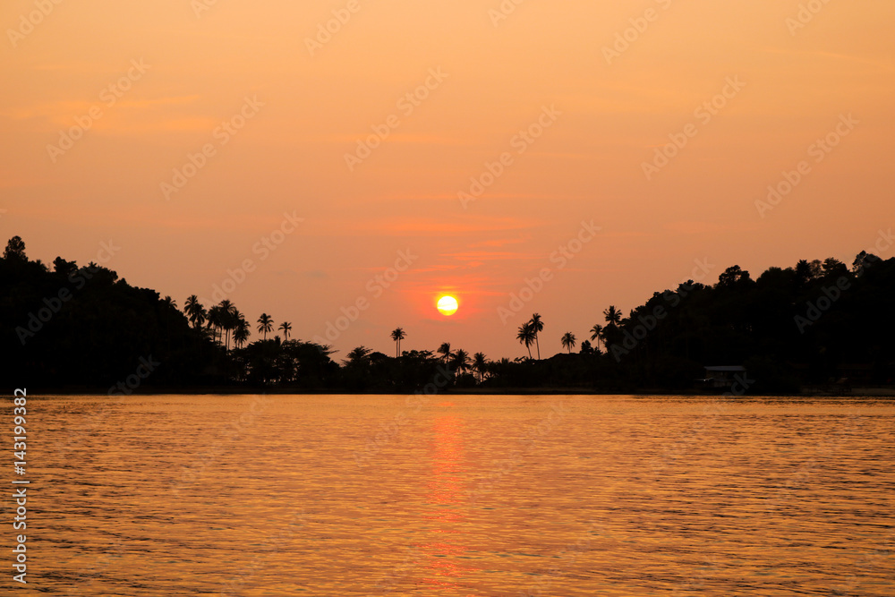 Silhouette of sunset time. Seascape of sunset at Bang Bao Koh Chang island, Trat Thailand.