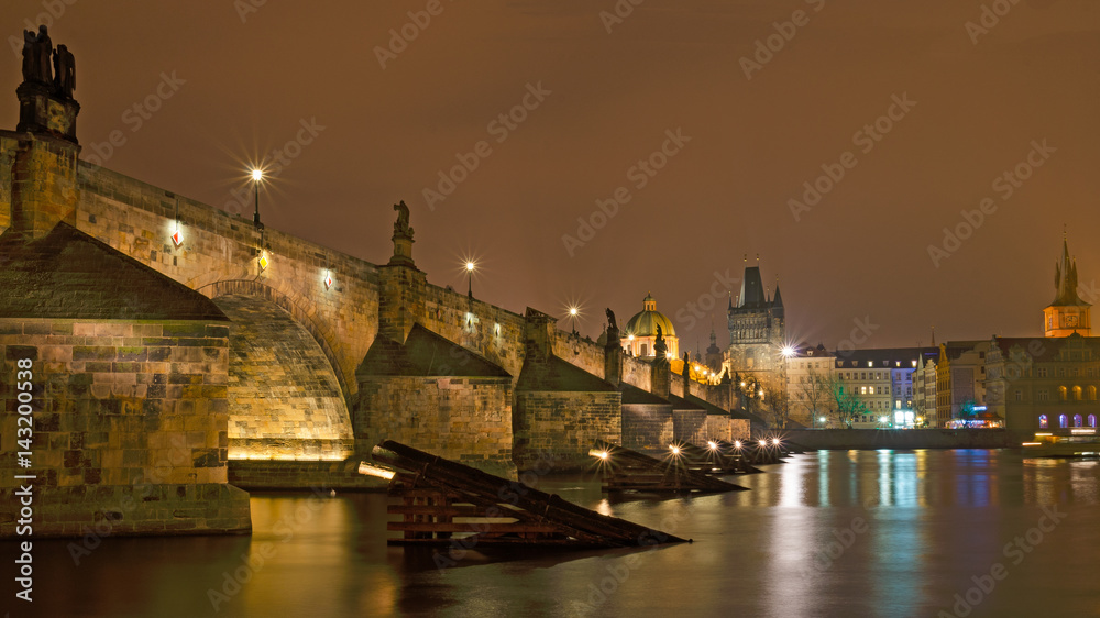 Charles bridge in the night. View from Kampa. Prague, Czech Republic.