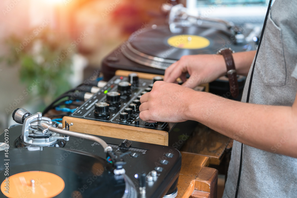 Dj play music at hip hop party.Turntable vinyl record player,analog sound  technology for disc jockey to scratch vinyl records and mix tracks Stock  Photo | Adobe Stock