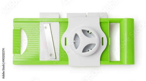 Top view of green plastic vegetable slicer