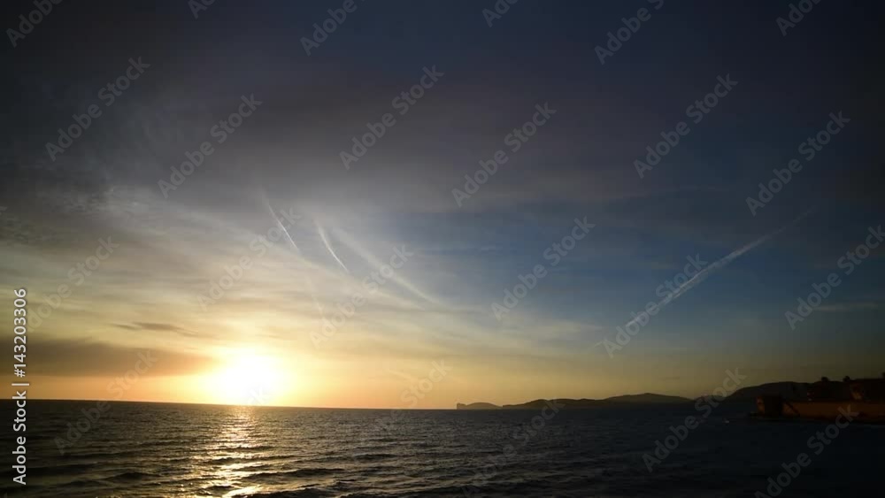Cloudy sky over Alghero at sunset Cloudy sky over Alghero at sunset