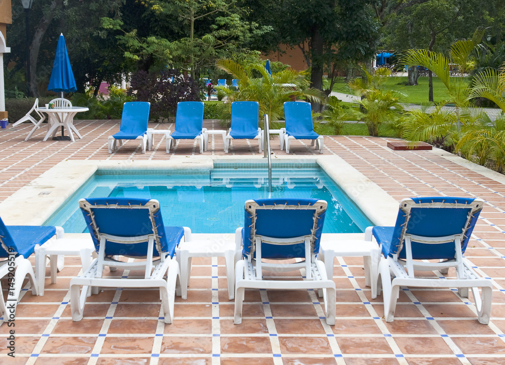 Beautiful pool and patio in tropical setting Beautiful pool and patio in tropical setting