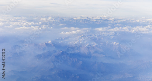 View of the mountains of Italy from the airplane © alexmu