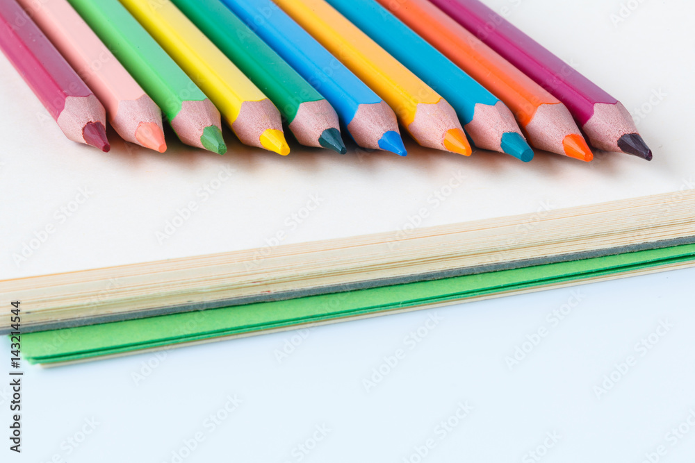 Fototapeta premium Notebook and colorful pencil