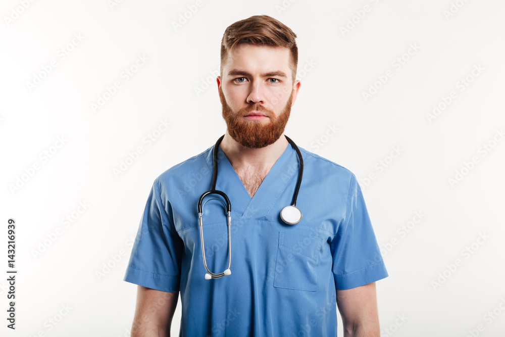 Portrait of a serious confident male doctor standing Portrait of a serious confident male doctor standing