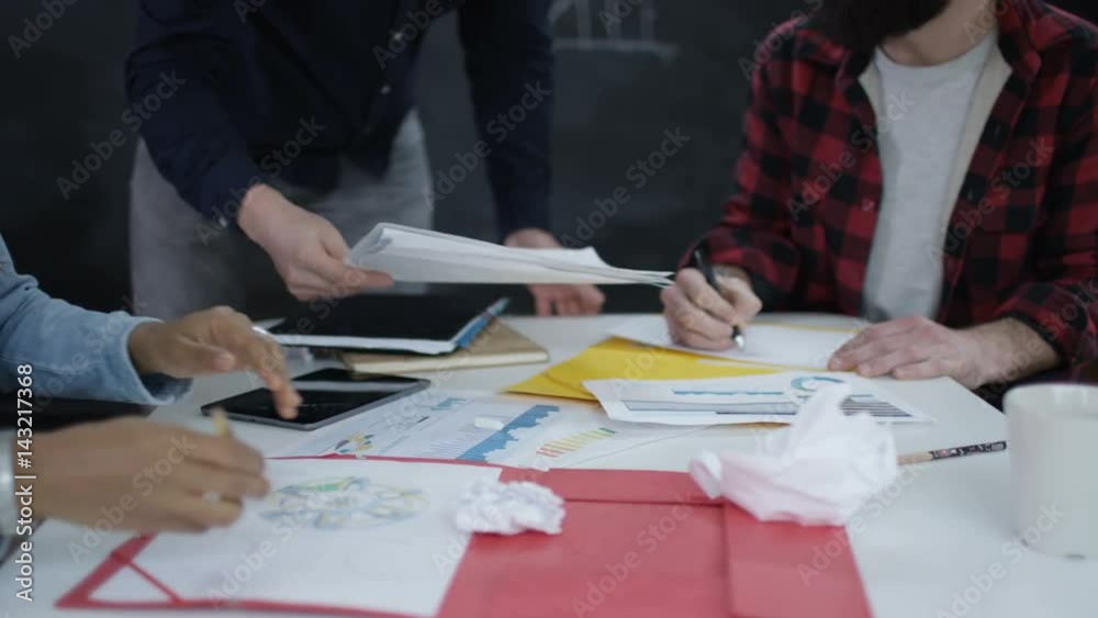  Young professional team working in creative business startup