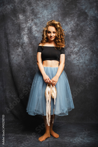 Ballet dancer in blue skirt and Ballet Shoes