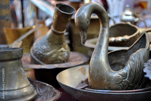 Antique objects displayed on flea market.