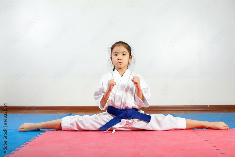 Children during training in karate. Fighting position Children during training in karate. Fighting position