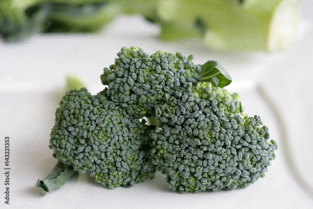 Close up of fresh broccoli on white background. Close up of fresh broccoli on white background.