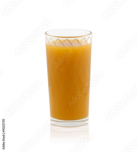 Yellow juice in a glass cup on a white background without shadow