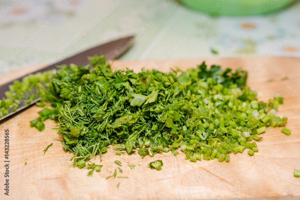 Greens for salad. Cut onions, fennel. Healthy food. Greens for salad. Cut onions, fennel. Healthy food.